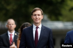 FILE - White House Senior Adviser Jared Kushner walks away following a television interview on the North Lawn at the White House, in Washington, Sept. 15, 2020.