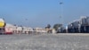 Trucks loaded with humanitarian aid wait on the Egyptian side of the Rafah border crossing with the Gaza Strip on Jan. 18, 2025, following the Israeli Cabinet's approval of a ceasefire deal amid the ongoing war between Israel and Hamas.