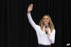 FILE - Republican National Committee Co-Chair Lara Trump walks onstage at a campaign event for Republican vice presidential nominee JD Vance in Monroe, North Carolina, Oct. 25, 2024.